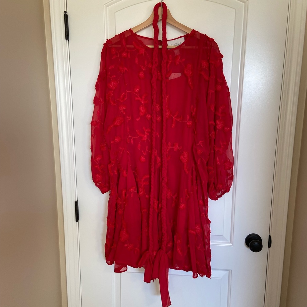Stunning Emboidered red dress size M/L bought new at Anthropologie. Never worn.